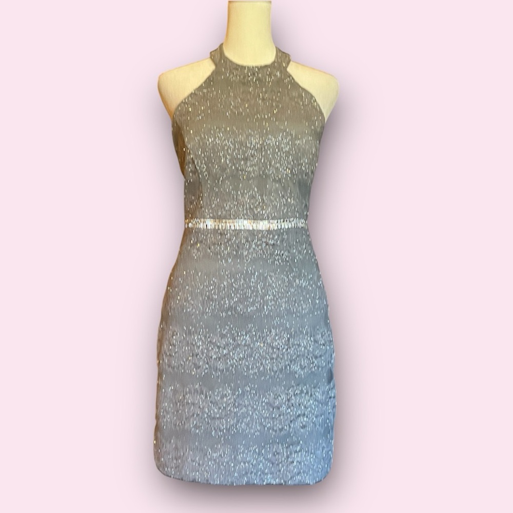 Silver glitter mini dress w/ rhinestone waist. Halter neckline, built-in bra. 10